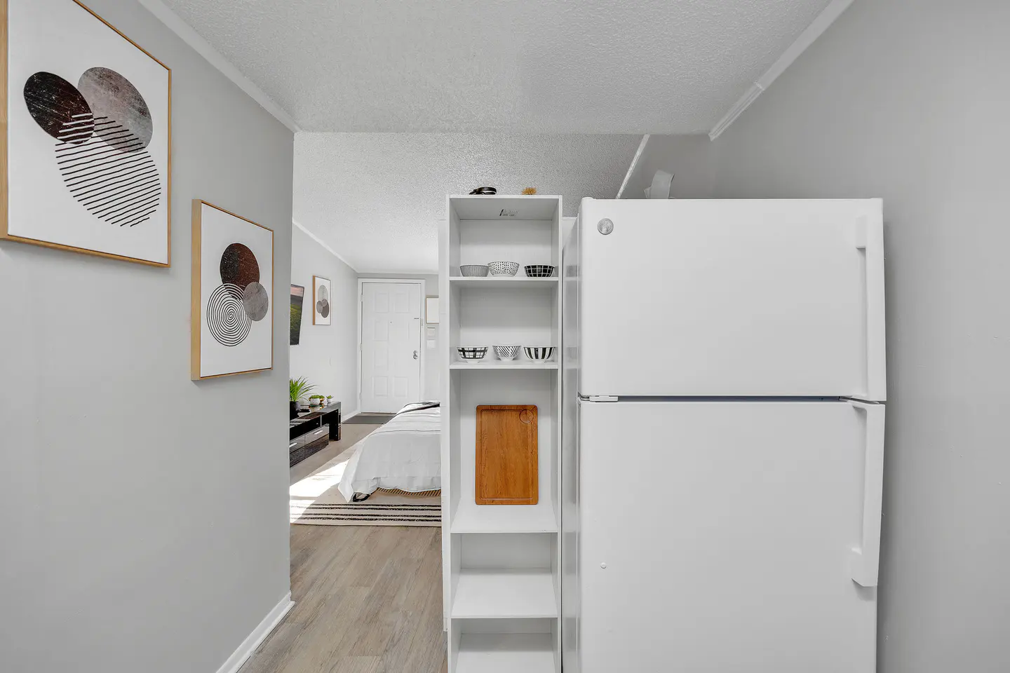 Bright apartment kitchen with supplied appliances