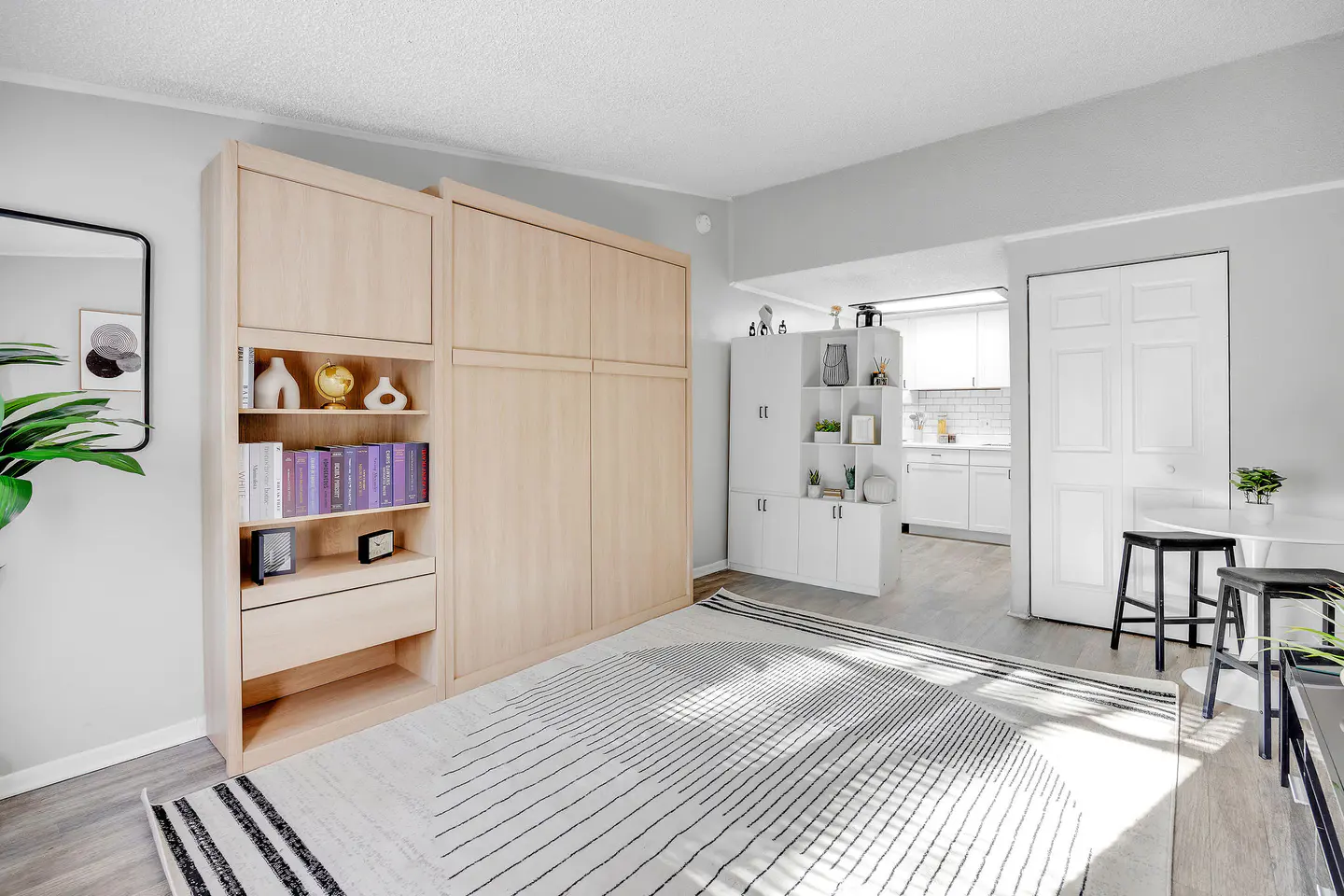 Wood storage divider in an apartment interior