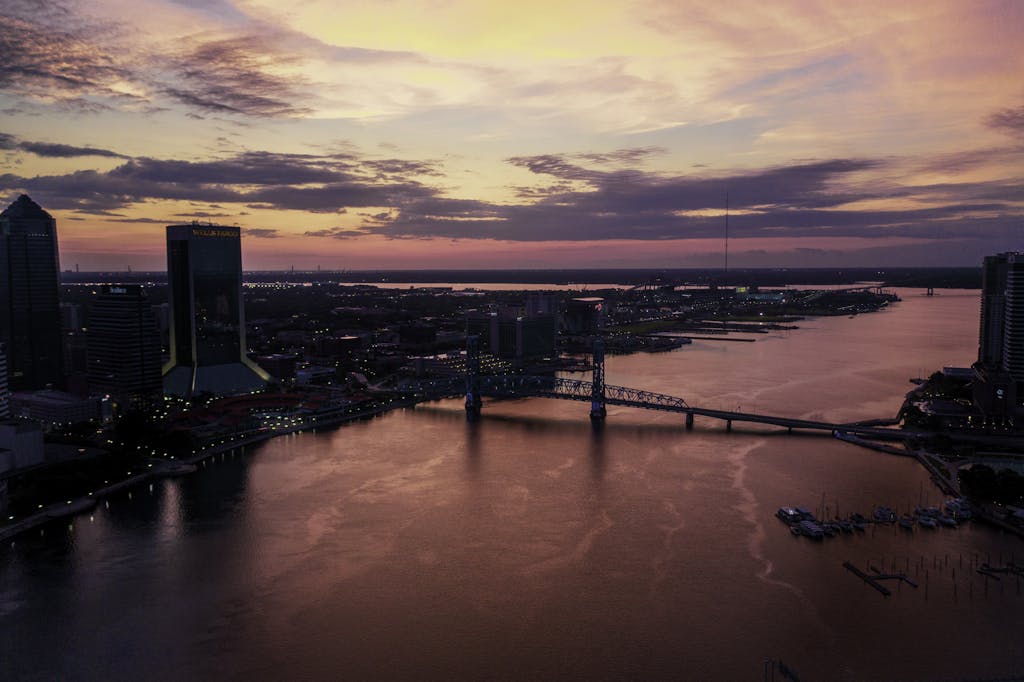 A breathtaking view of Jacksonville's urban skyline captured during a vibrant sunset.