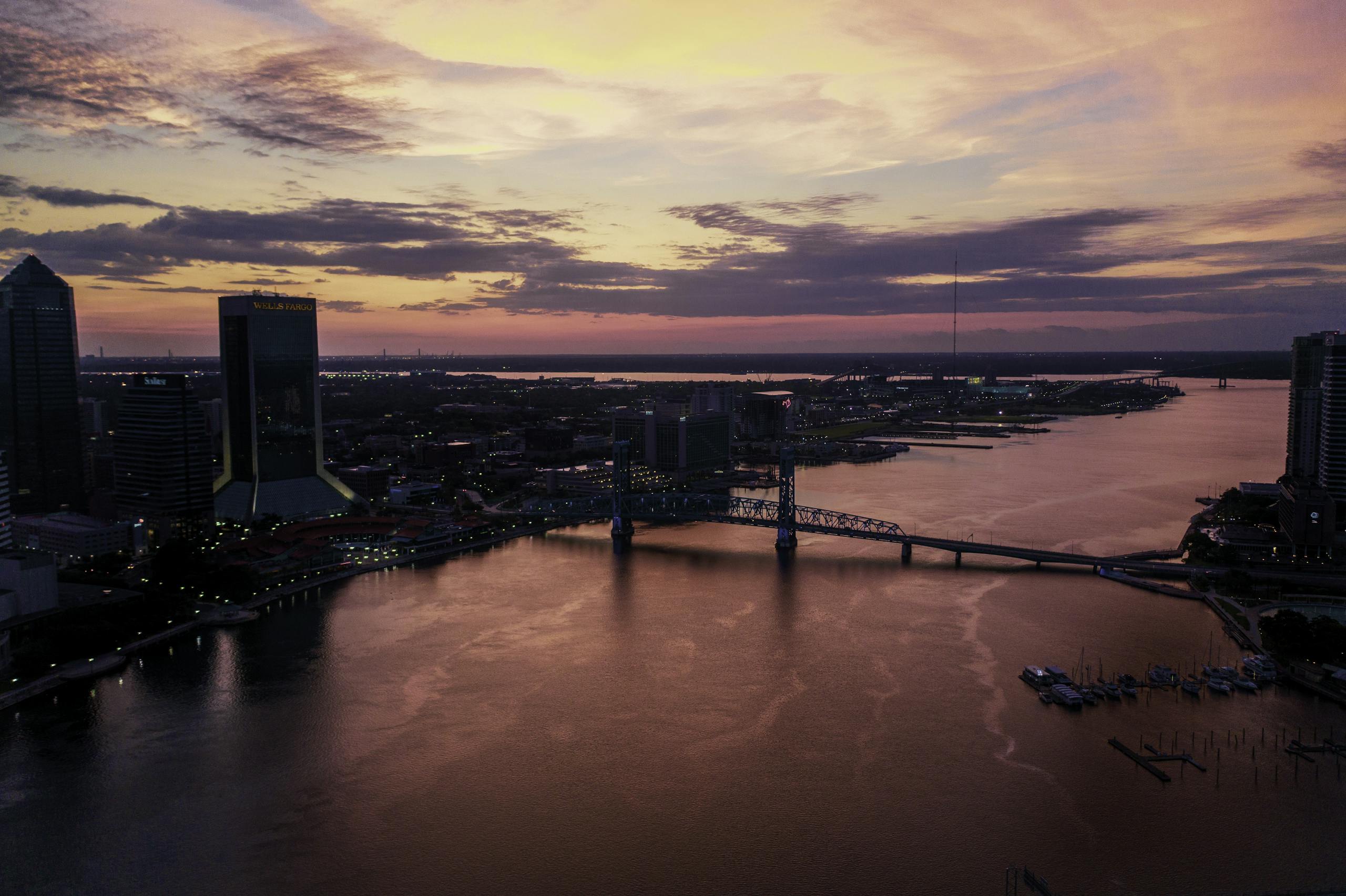 A breathtaking view of Jacksonville's urban skyline captured during a vibrant sunset.